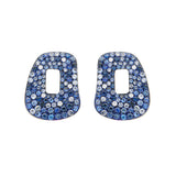 One pair of Puzzle element 18k white gold, white diamonds and blue sapphires