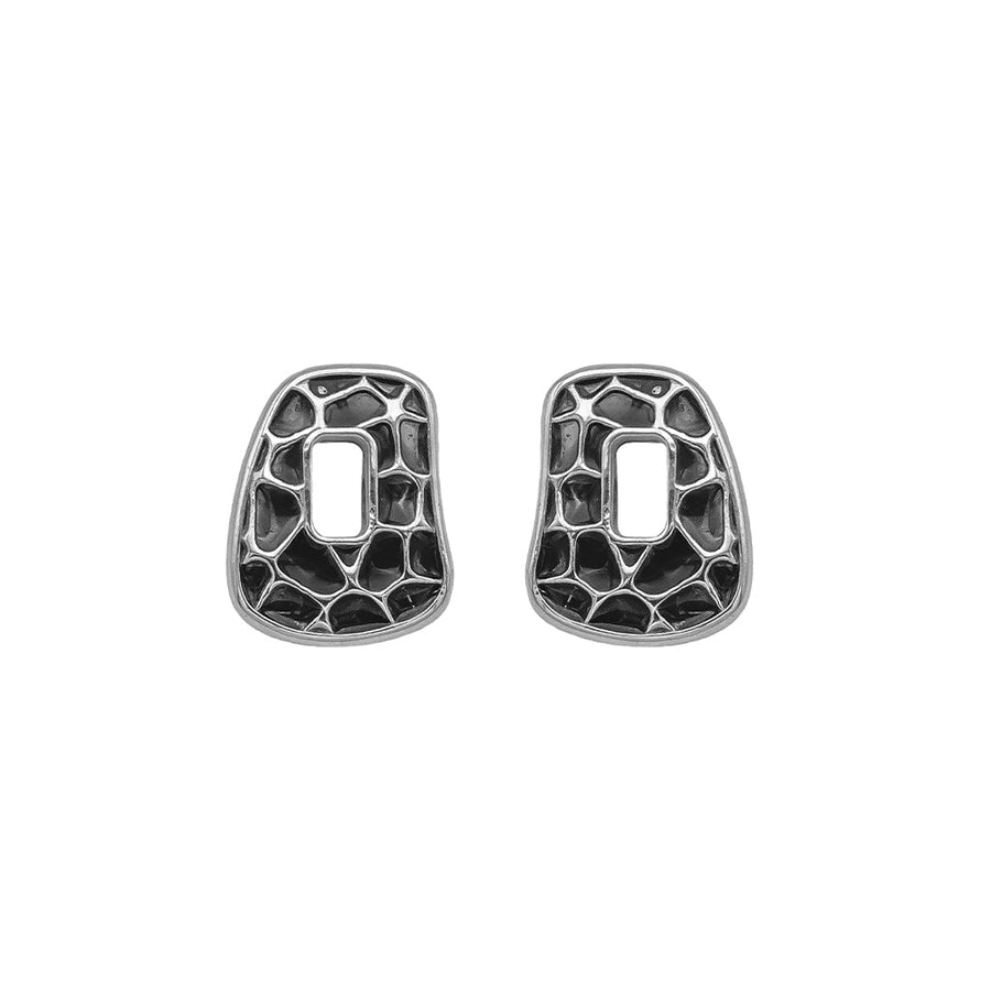 One pair of Puzzle element  18k white gold and black enamel